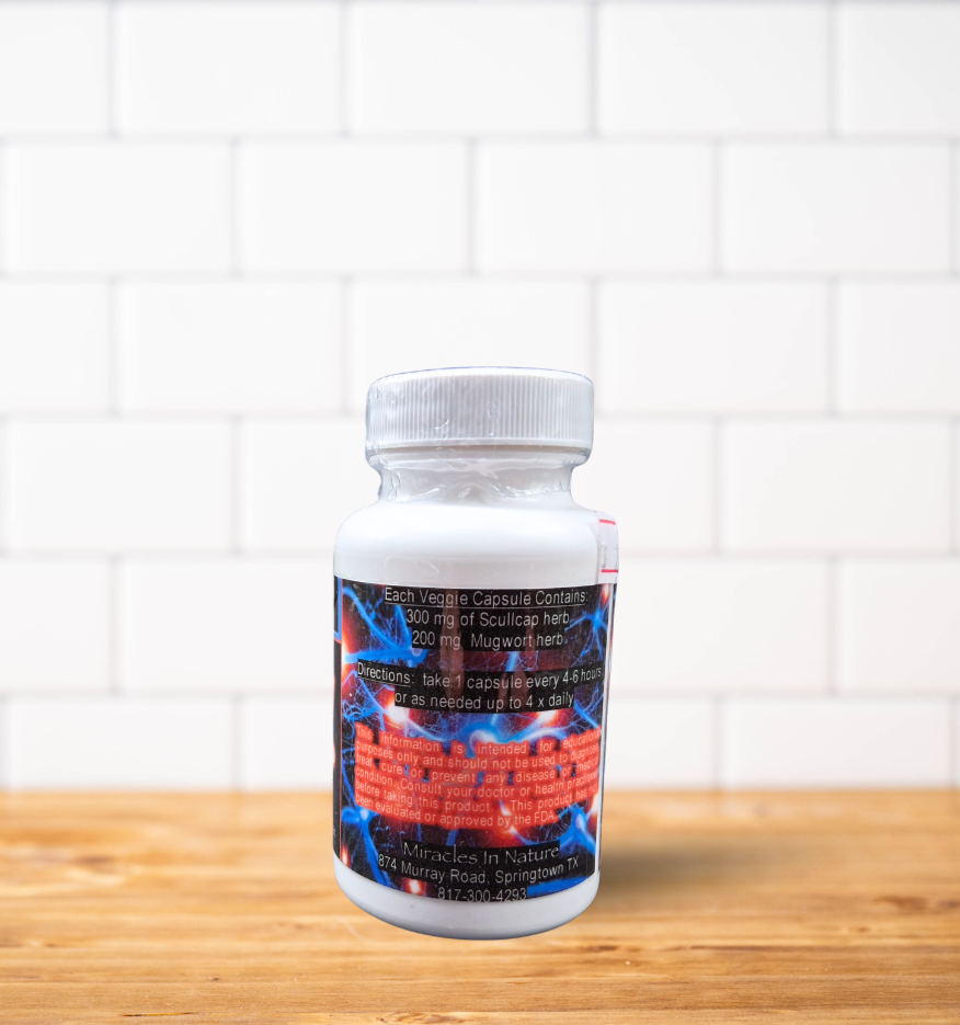 A bottle of pills is sitting on a wooden table.