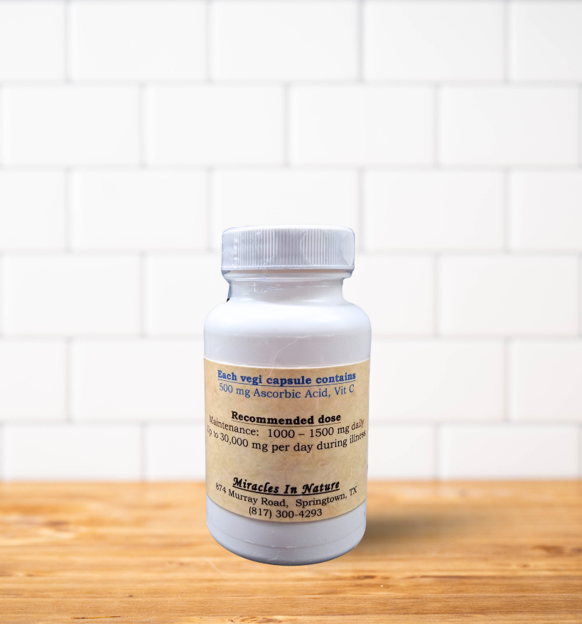 A bottle of pills is sitting on a wooden table.