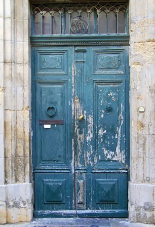 Laser clean wooden door with peeling paint. Ready for repainting.