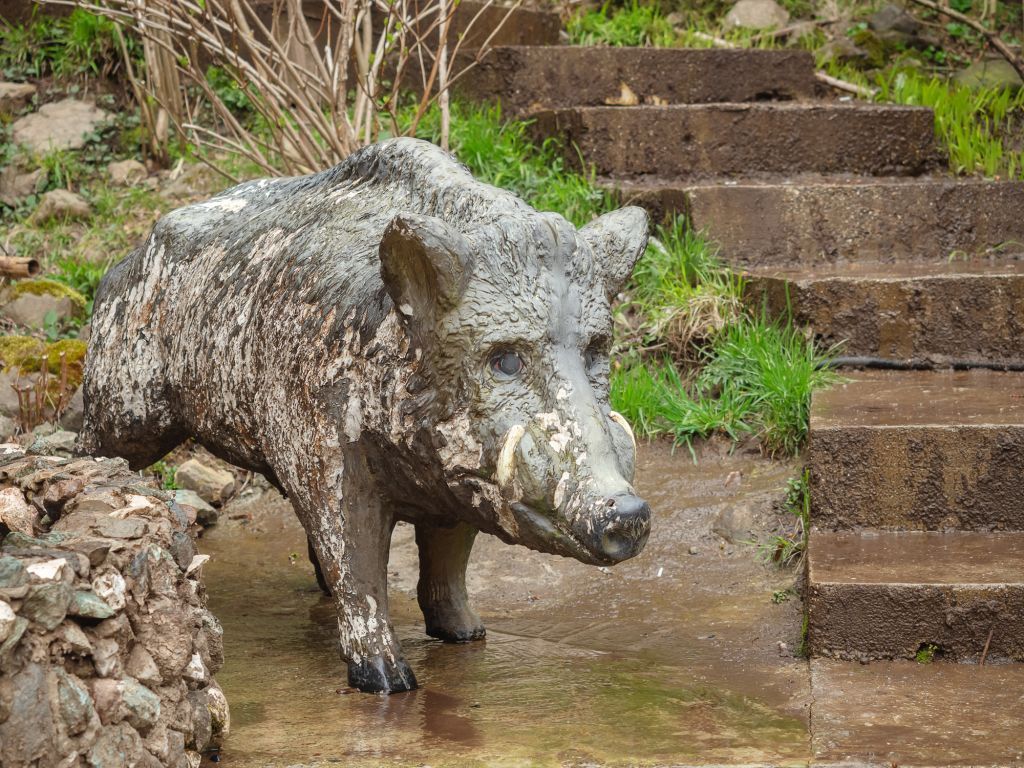 Laser clean stone and concrete statues.