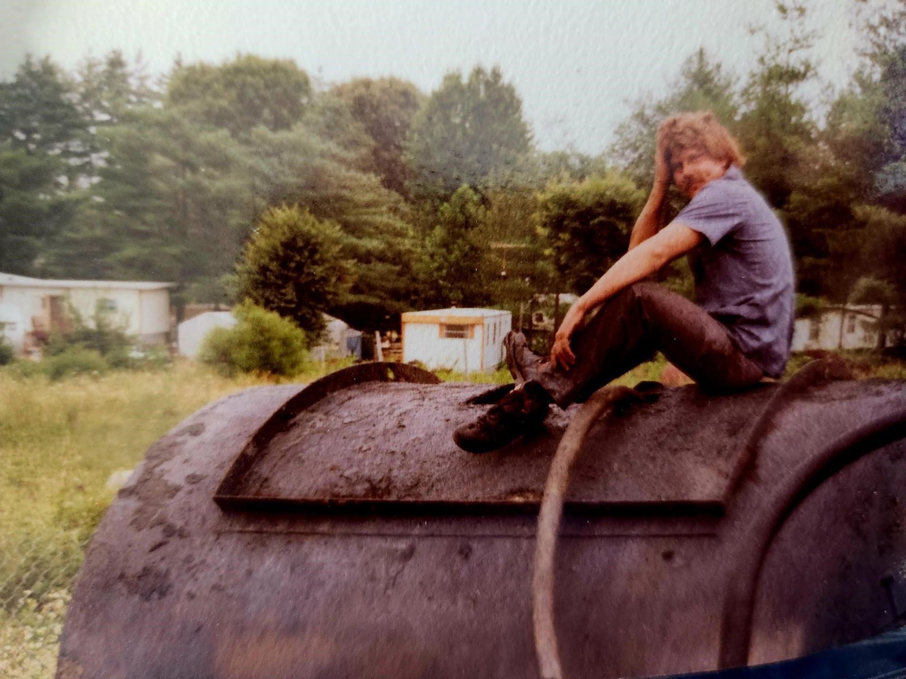 Man Sitting at the Top of the Tank — Hendersonville, N.C. — Tarheel Paving