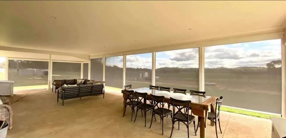 Bright Living Room With Sofa and Dining Table — Paint Place Cowra in Cowra, NSW