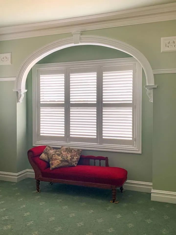 Red Chaise Lounge With Pillow Under a Bay Window — Paint Place Cowra in Cowra, NSW