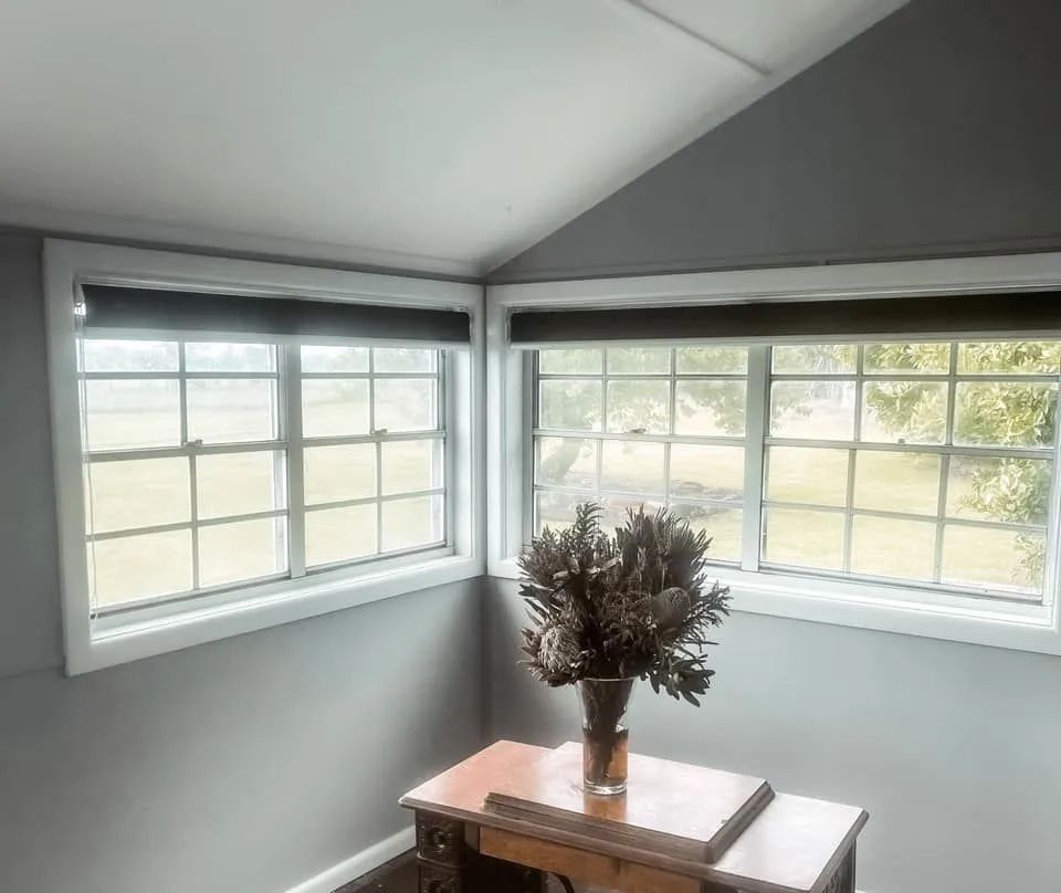 Bright Corner Room With Two Windows, Grey Walls — Paint Place Cowra in Cowra, NSW