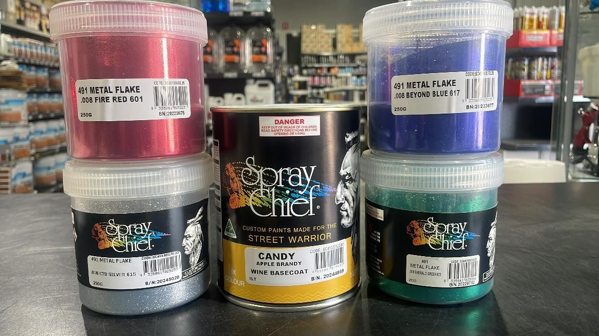 Assorted Glitter Paint Jars Stacked on a Store Counter — Paint Place Cowra in Forbes, NSW