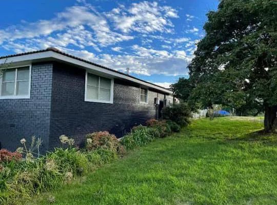 Dark Blue House With White-trimmed Windows — Paint Place Cowra in Cowra, NSW