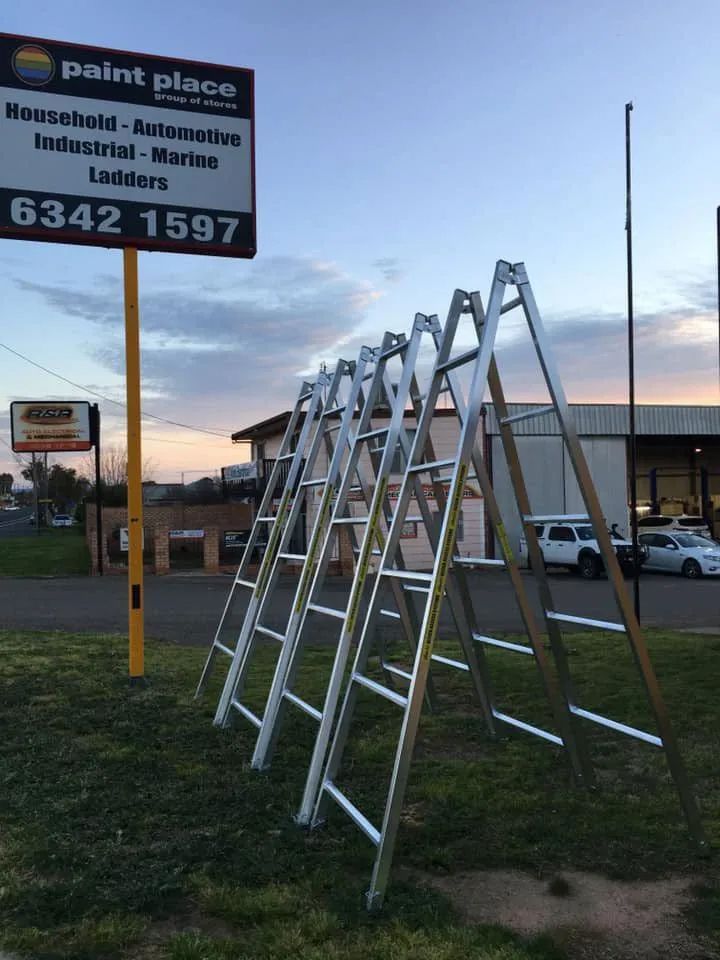 Metal Ladders Displayed Outside a Paint Place Hardware Store — Paint Place Cowra in Bathurst, NSW