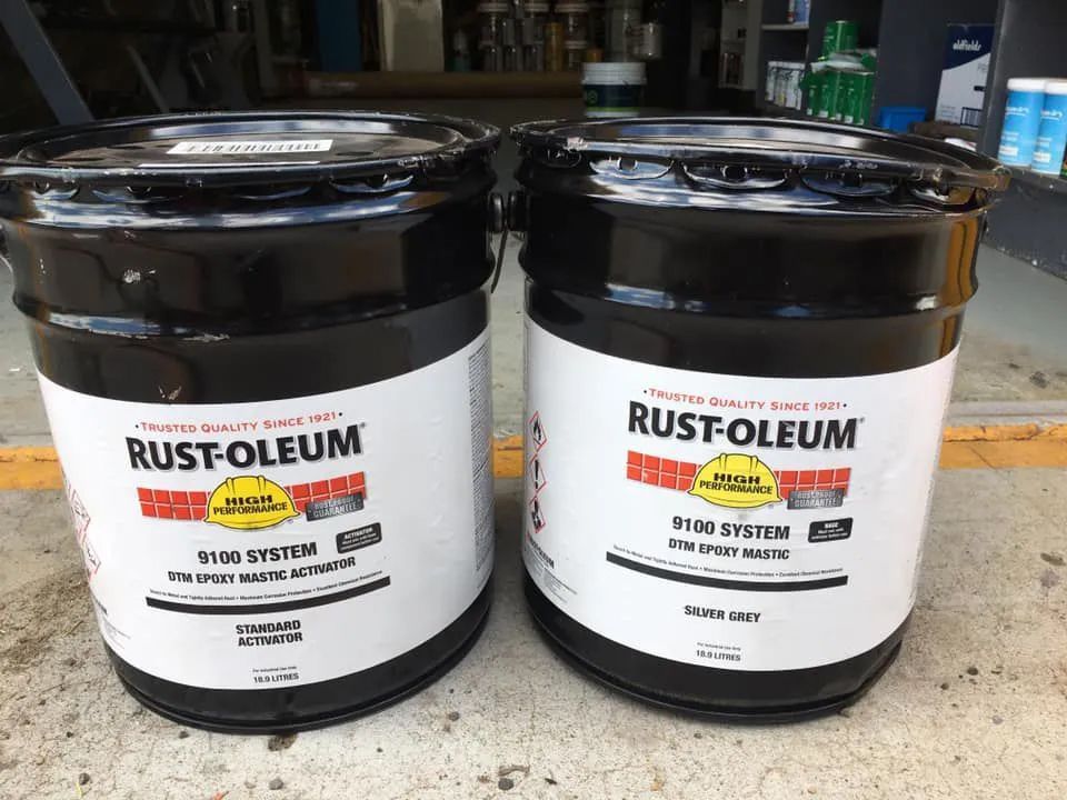 Two Rust-oleum Storm System Paint Buckets on a Countertop — Paint Place Cowra in Cowra, NSW
