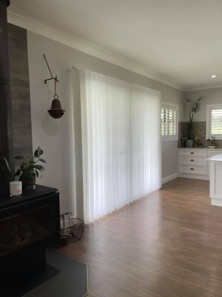 Bright Living Room With Sheer Curtains — Paint Place Cowra in Cowra, NSW
