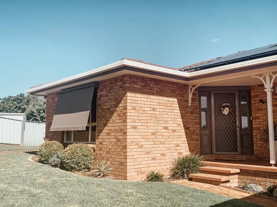 Brick House Exterior With Front Porch — Paint Place Cowra in Cowra, NSW