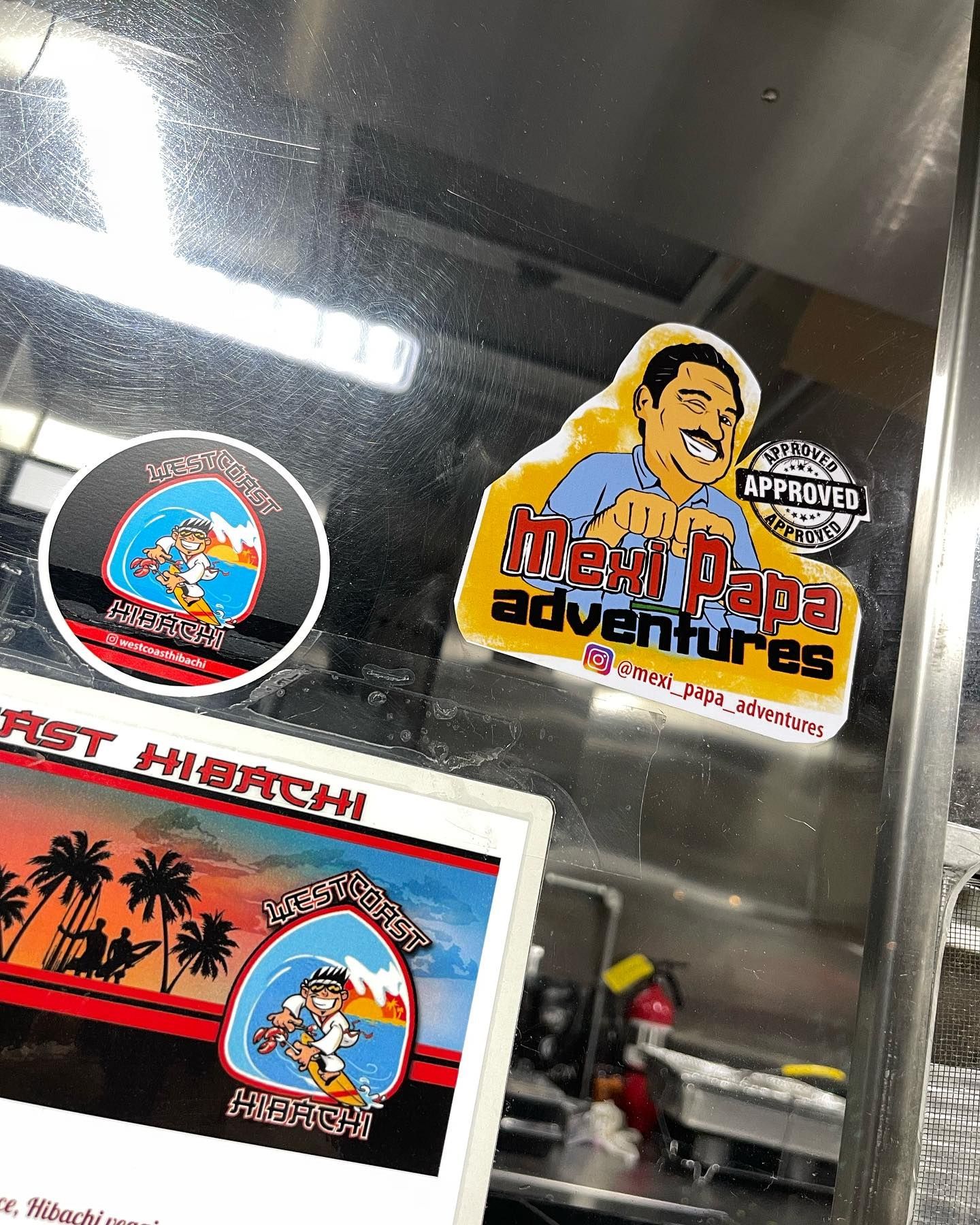 A sticker that says meat papa adventures on it