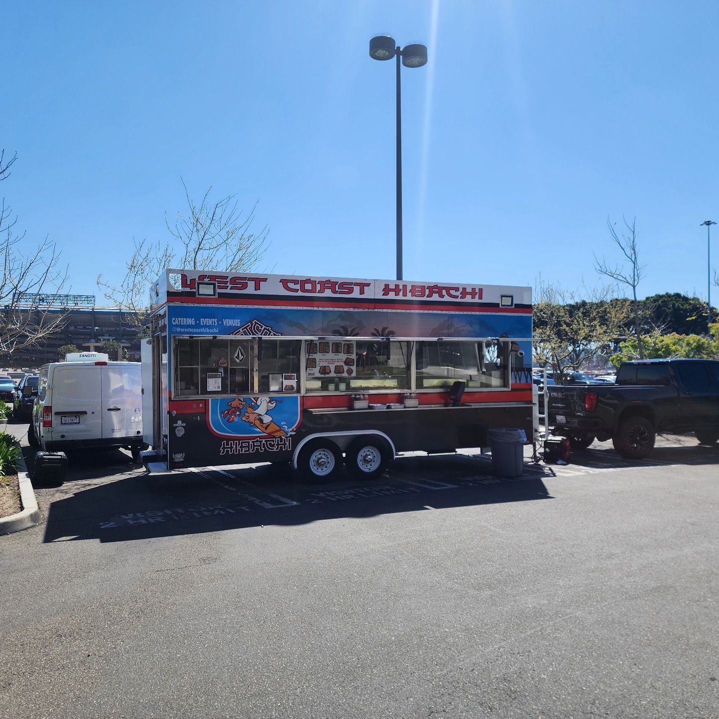 A food truck with the word hi-tech on it