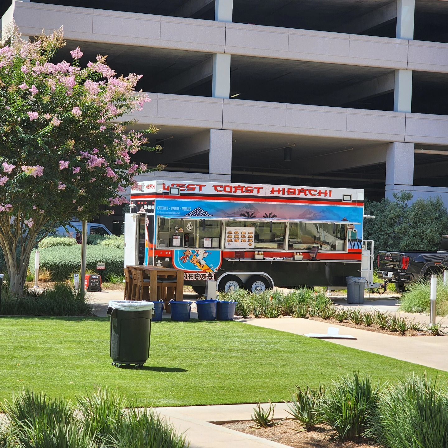 A food truck that says coast hi-tech on the side