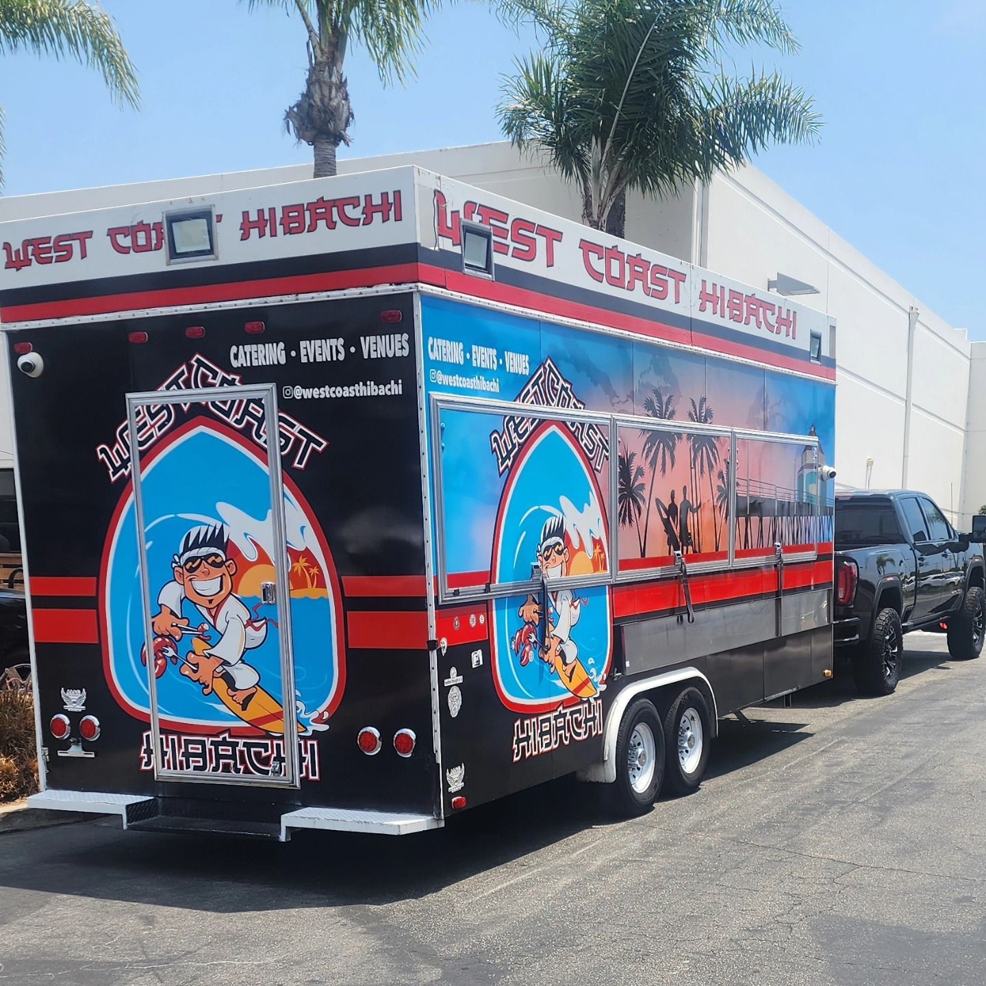 A west coast hibachi trailer is parked on the side of the road