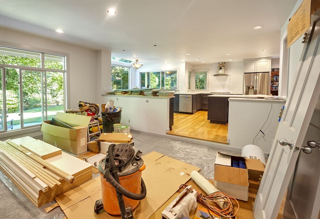 A house is being remodeled and a vacuum cleaner is in the middle of the room. A house is being remodeled and a vacuum cleaner is in the middle of the room.