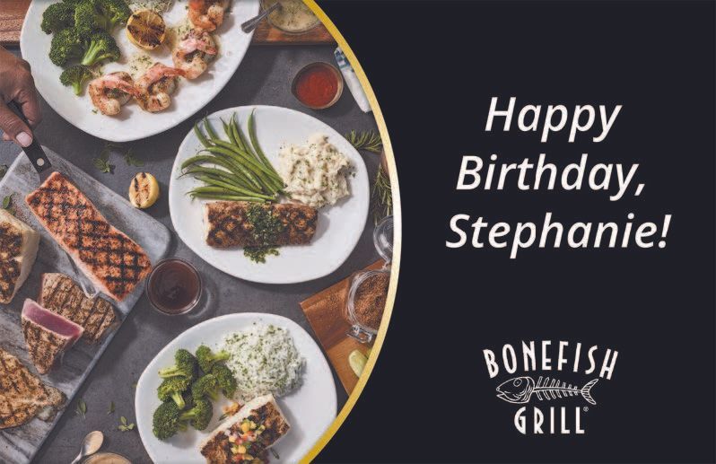 Birthday greeting for Stephanie from Bonefish Grill. Food spread on dark background.