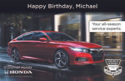 Red Honda Accord in motion with birthday message