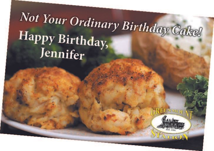 Crab cakes and baked potato on a plate, text