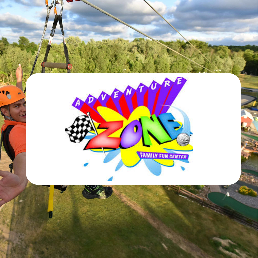A man is riding a zip line at the adventure zone