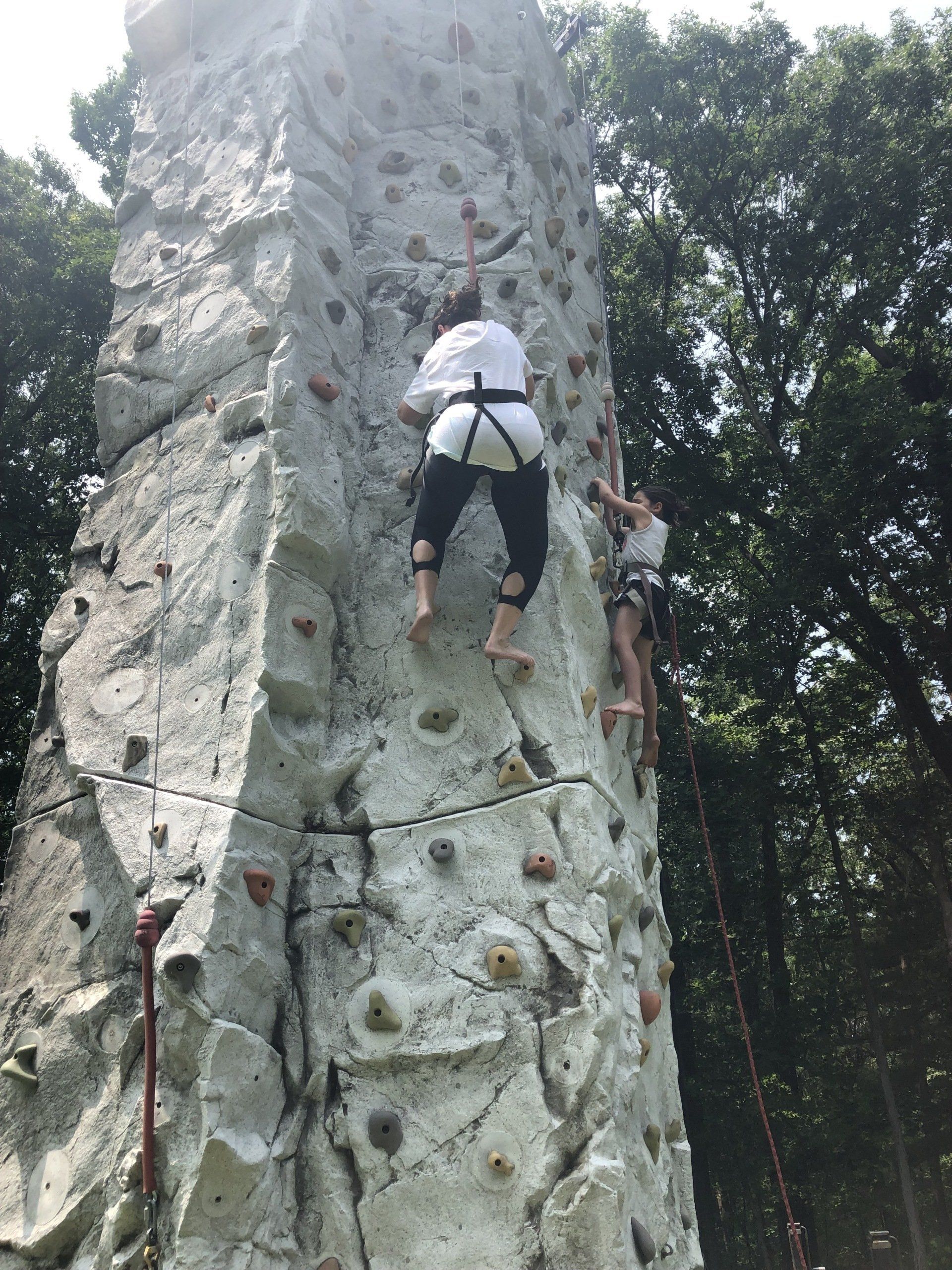 Mother and Daughter Climbing on The Rock Wall Climbing — Chicopee, MA — Cliffhangers Portable Rock Climbing Wall