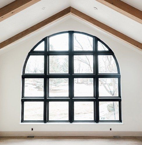 There is a large window in the middle of the room.