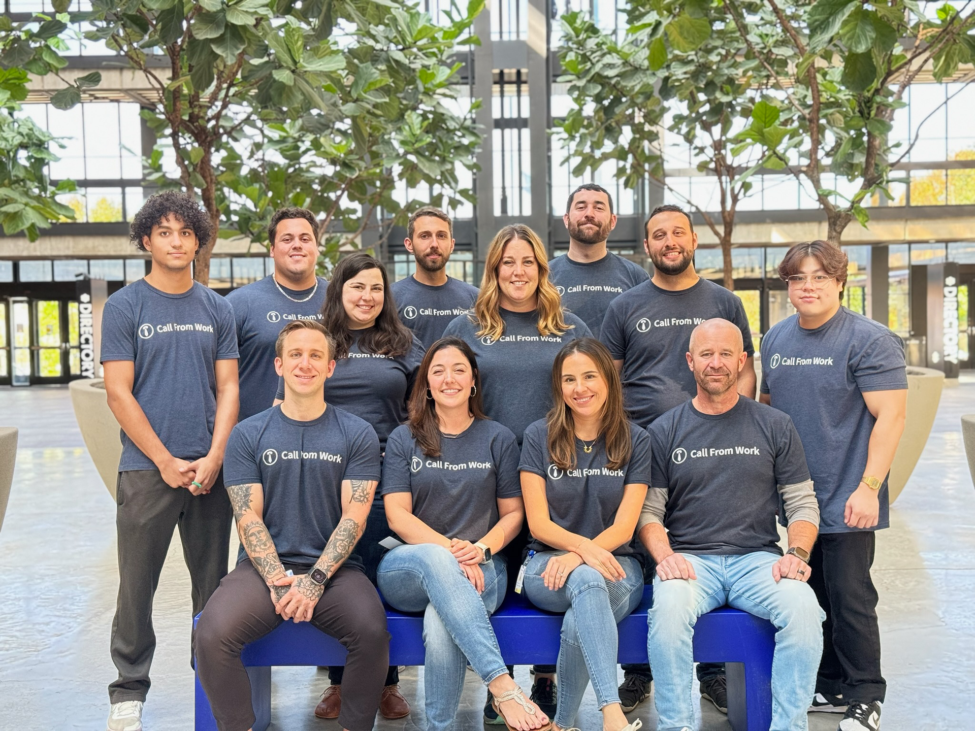 A group of people are posing for a picture together.