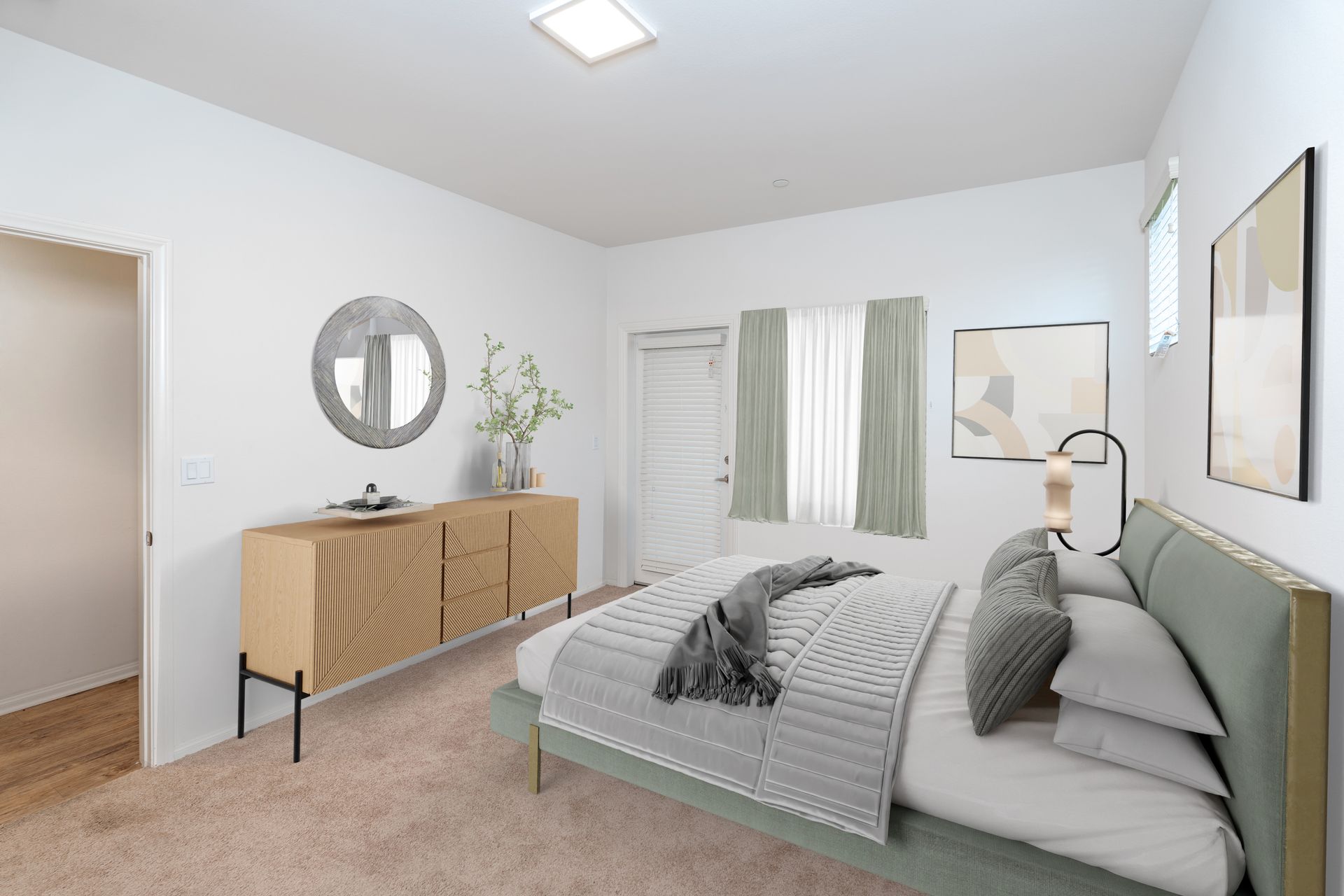 A bed room with a bed with a window and a cloths dresser