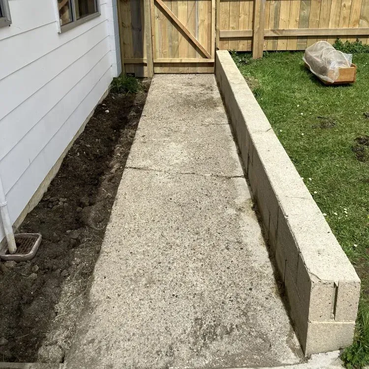 After: concrete path cleaned with water blasting as part of a section tidy in Bradford, Dunedin.
