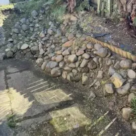 After: Weed removal and clearance from the rock wall, Roslyn.