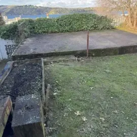 After: Backyard tidy up of overgrown grass and garden bed in Rosyln.