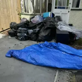Before: General rubbish and household waste piled outside a residential property in North Dunedin, Dunedin.