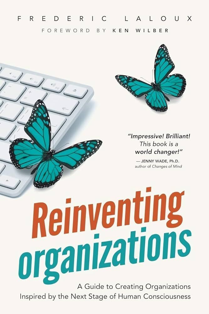 The cover of a book titled reinventing organizations