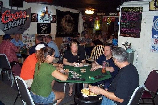 Group of people playing cards