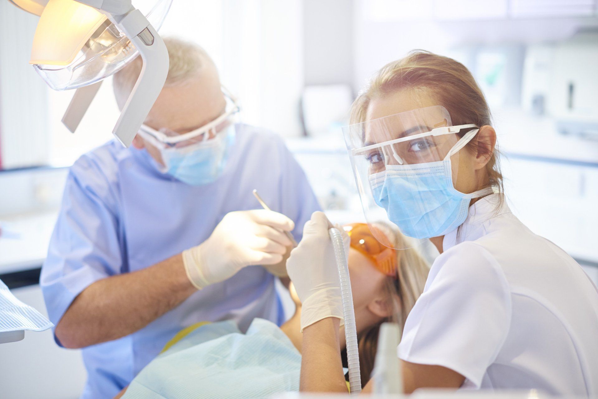 Dental Nurse Turns And Smiles To Camera - West Carrollton, OH - DATS Dental Assistant School LLC Dental Nurse Turns And Smiles To Camera - West Carrollton, OH - DATS Dental Assistant School LLC