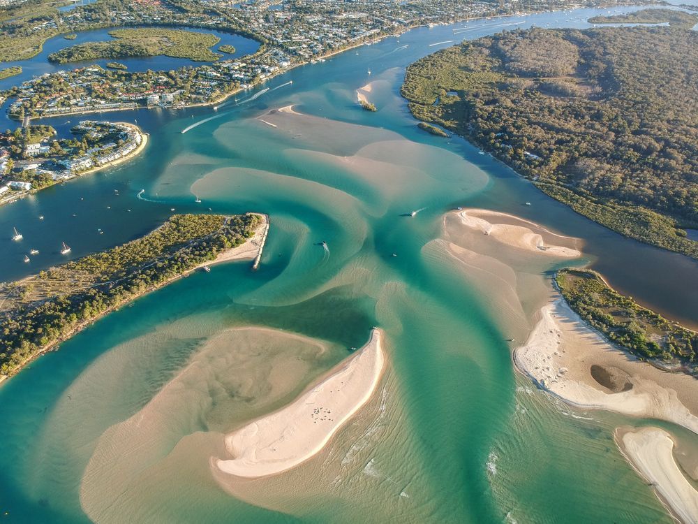 An Aerial View of a Large Body of Water Surrounded by Islands — We Clean Lounges In Noosa Heads, QLD