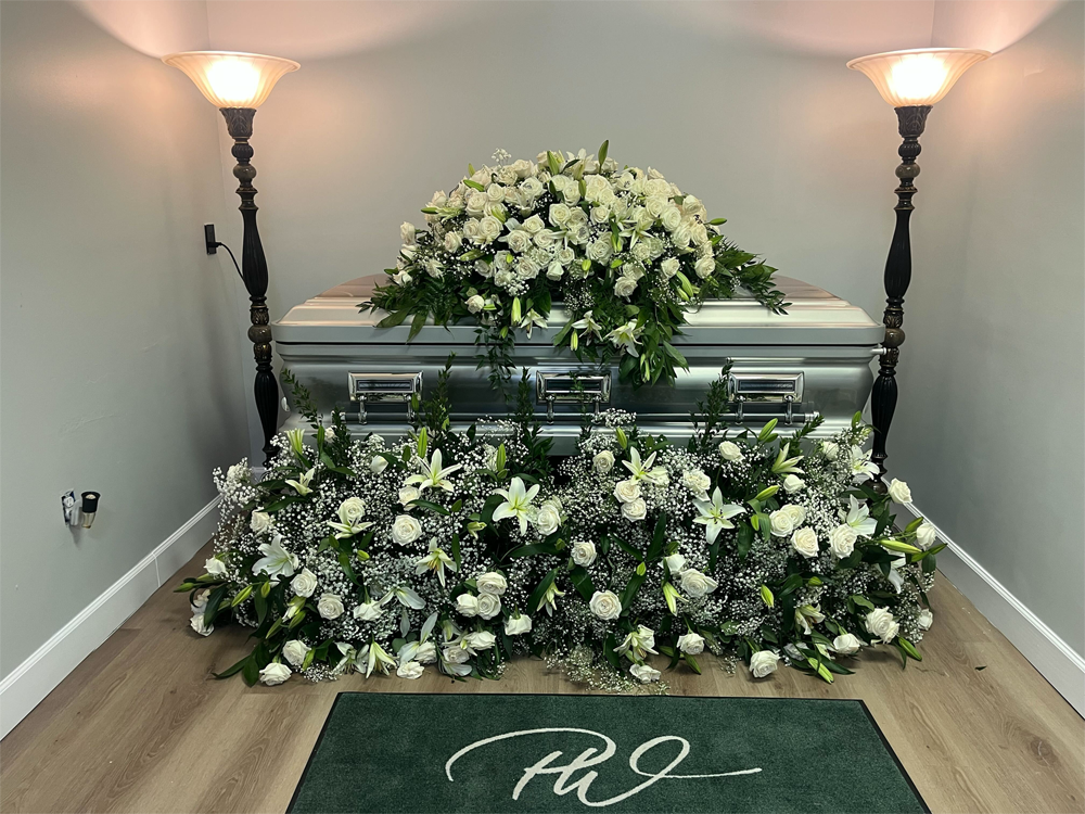 Funeral Service with Casket and Flowers