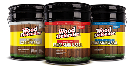 Three cans of Wood Defender fence stain and seal in different colors.