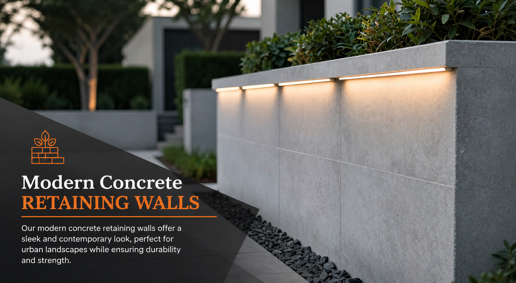 Modern concrete retaining wall with warm accent lighting and landscaped garden
