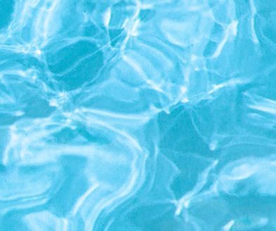 Light blue water surface with shimmering ripples and reflections