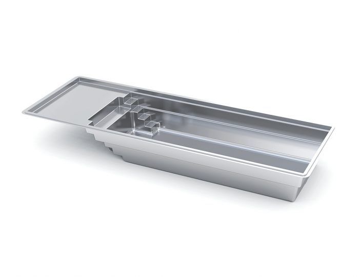 Stainless steel countertop sink with open hinged lid and built-in drainboard