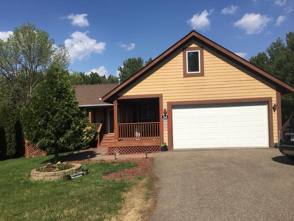 Beautiful House With Garage | New Richmond, WI | DC Roofing Inc. Beautiful House With Garage | New Richmond, WI | DC Roofing Inc.