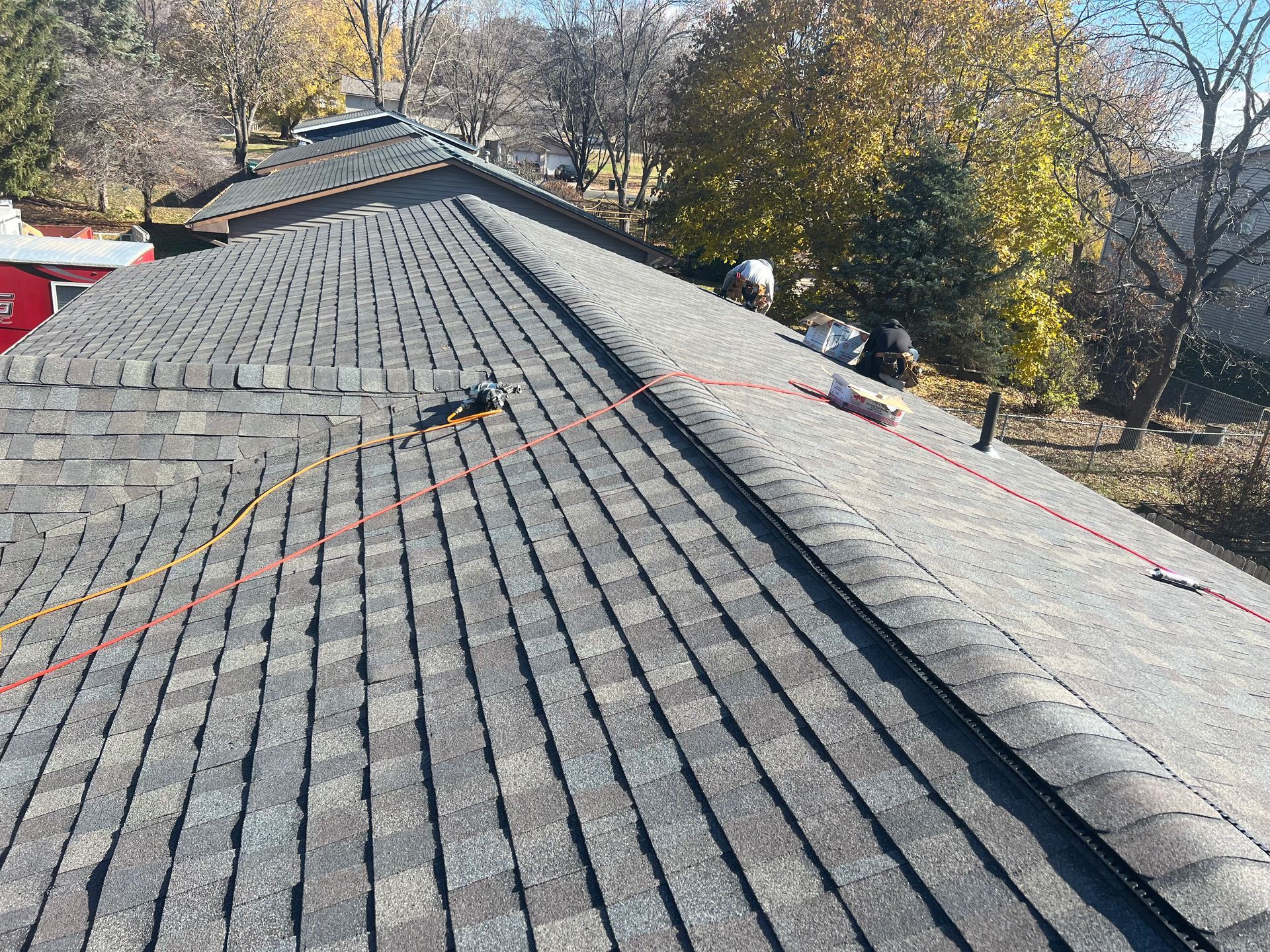Man Holding Hammer And Nail | New Richmond, WI | DC Roofing Inc. Man Holding Hammer And Nail | New Richmond, WI | DC Roofing Inc.