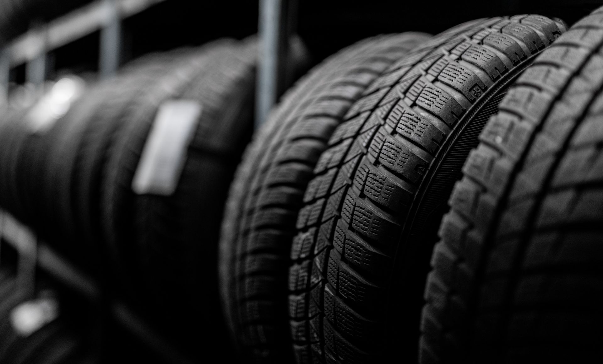 A Row of Tires in Warehouse | Suburban Tire Auto Repair Centers
