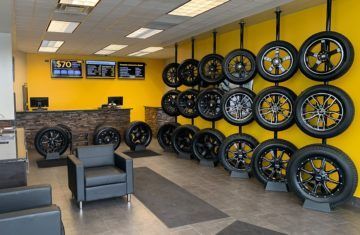 A Room Filled With Lot of Michelin Tires | Suburban Tire Auto Repair Centers