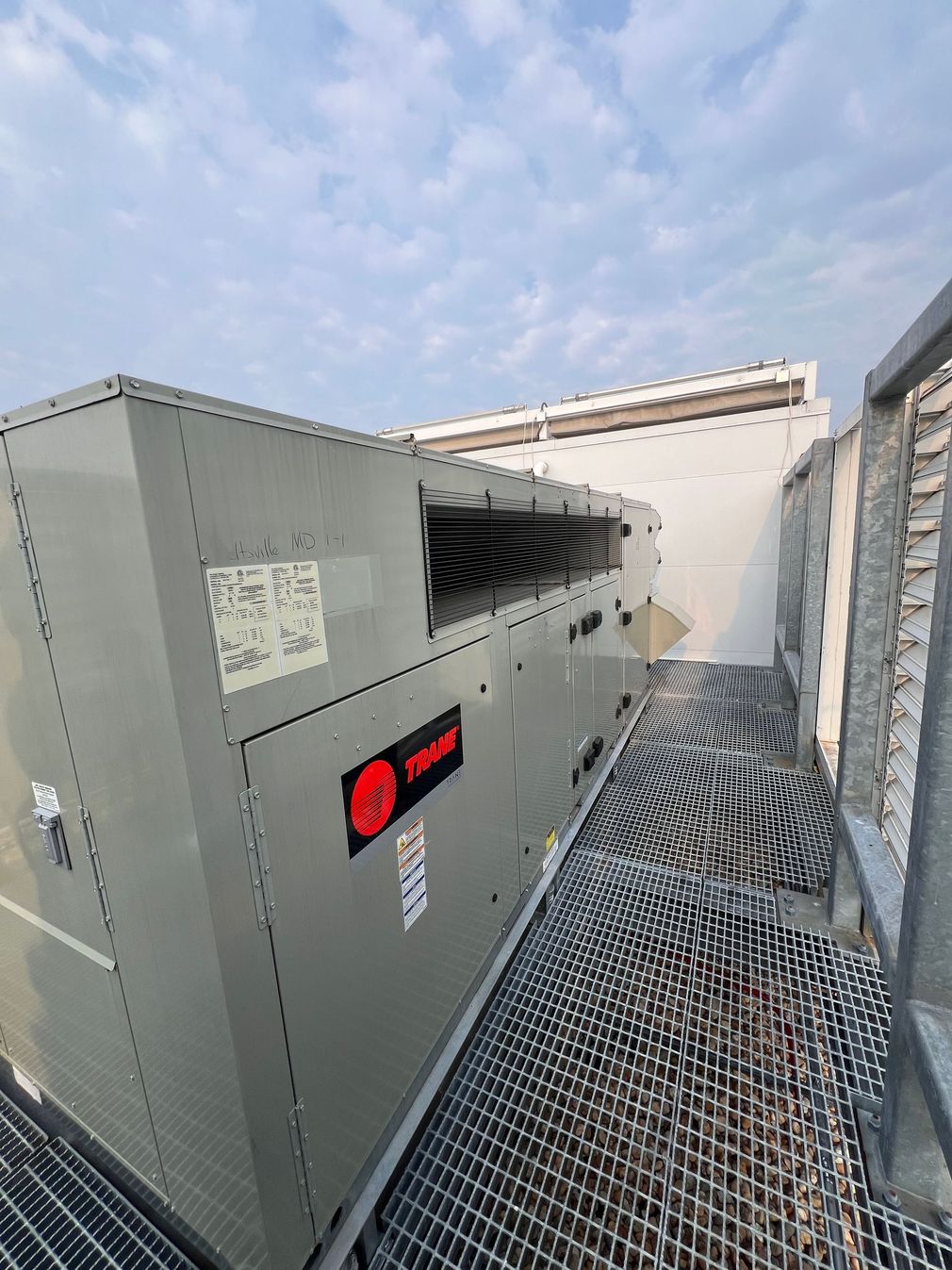 HVAC technician performing heating repair service in the DMV region