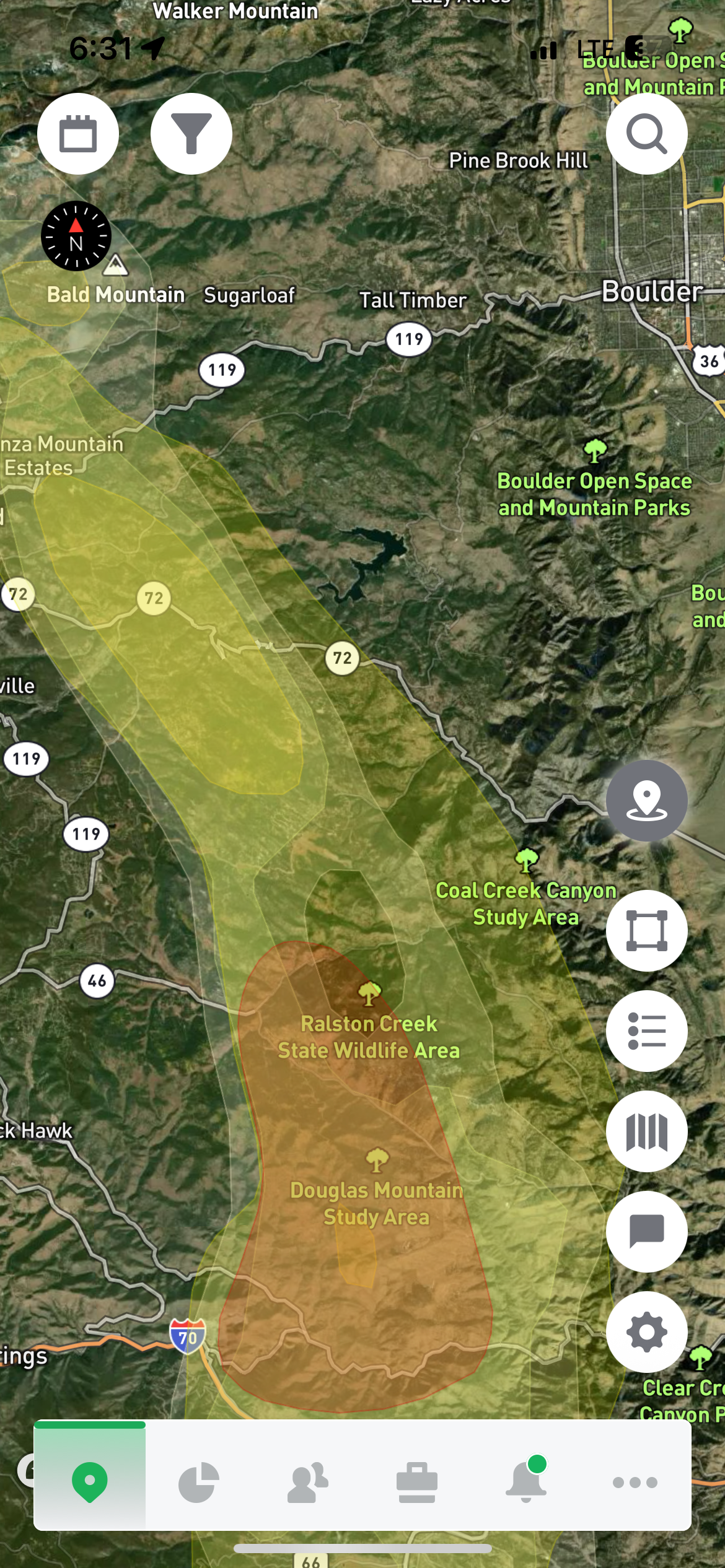 Map view of a fire hazard zone marked in orange and yellow over a mountainous landscape.
