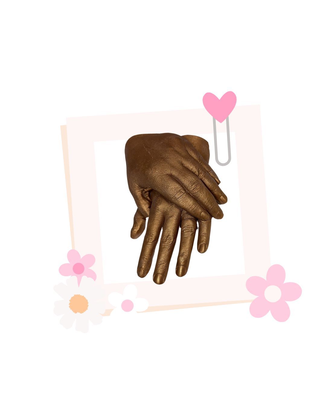 A couple of hands holding each other in a pink frame.