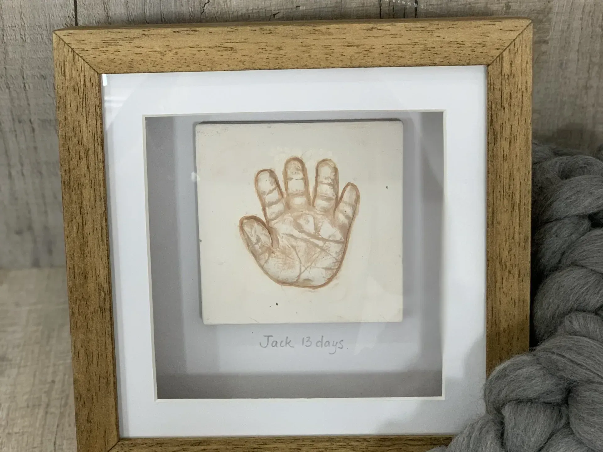 One tiny little newborn hand captured in this delicate outprint