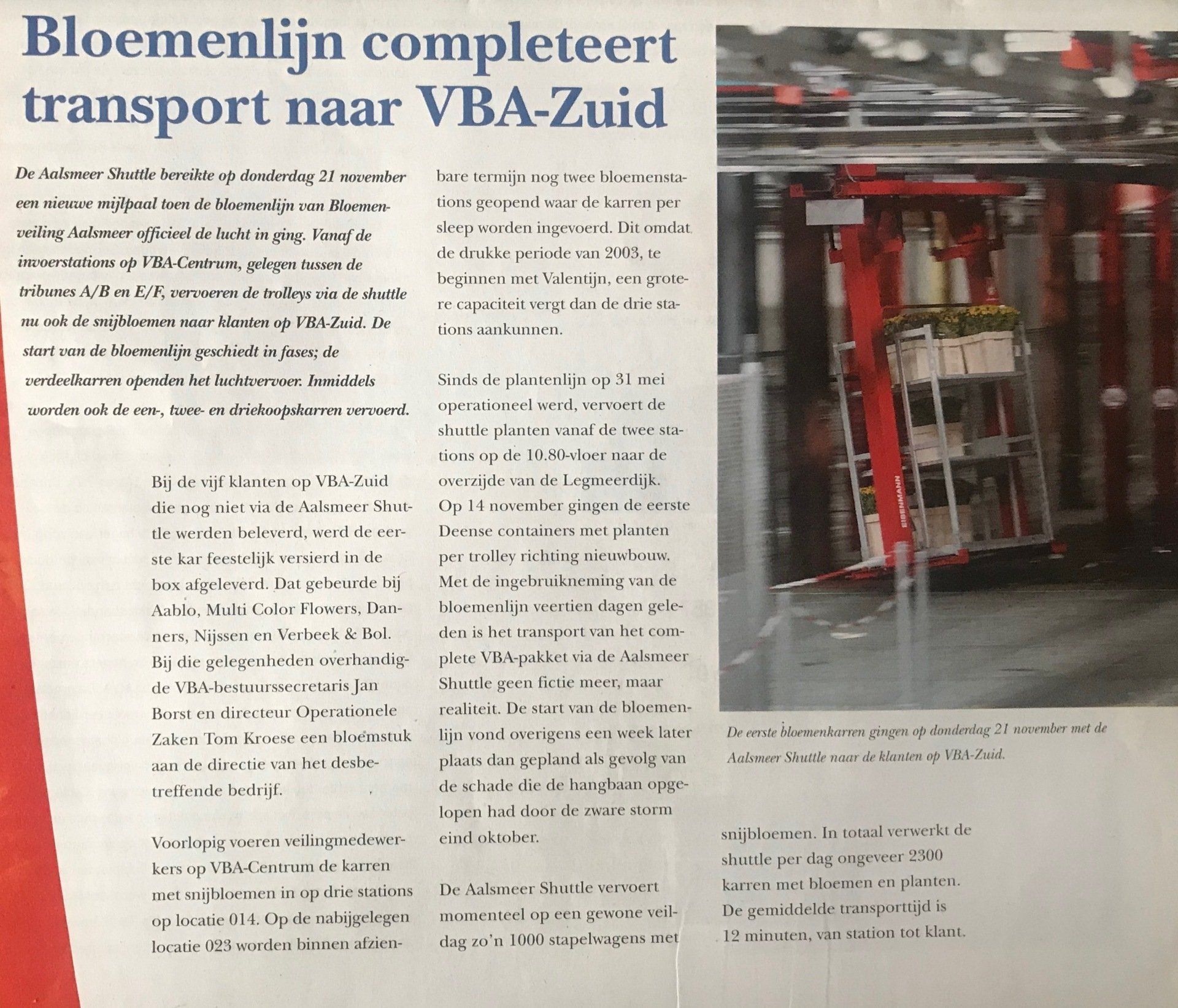 Artikel met tekst en foto van een transportsysteem voor bloemen. Titel: 