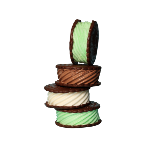 Stack of ice cream sandwiches in mint, chocolate, and vanilla flavors.